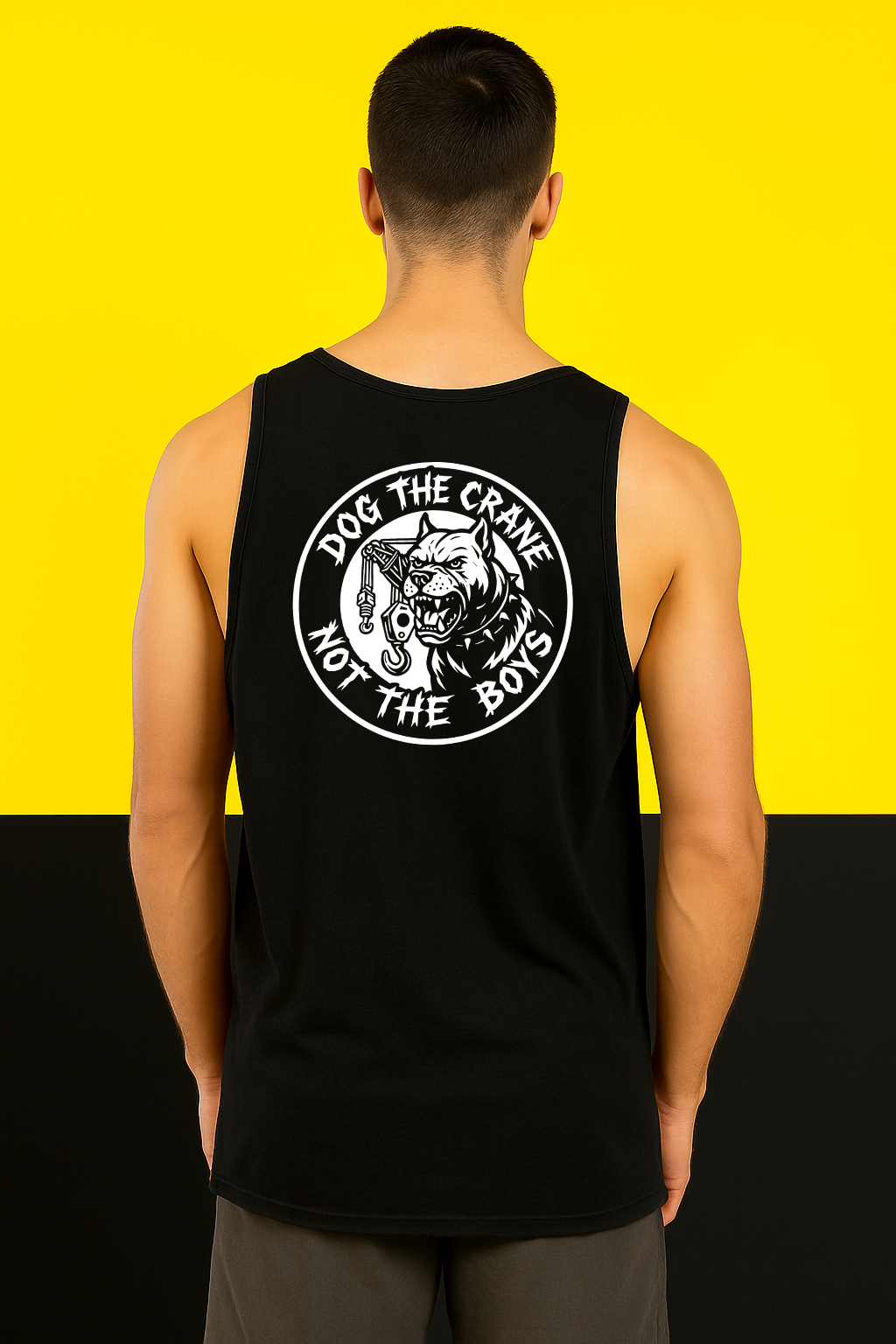 Person wearing a black tank top with a graphic design on the back against a yellow and black background